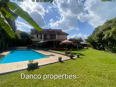 An Elegant All En-Suite 4 Bedroom Mansion Sitting on 0.5 Acres.