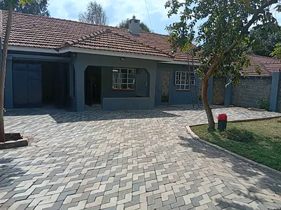 Unbeatable Deal! 4 Bedroom Bungalow Plus Sq in High End Location