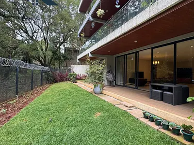 Luxury Furnished 4-Bedroom Residence with Private Garden