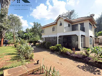 Spacious 7-Bedroom House on ½ Acre