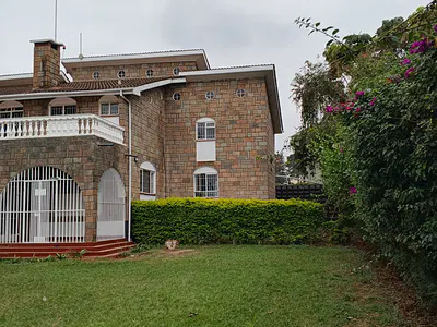Spacious 4 Bedroom Mansion on Half Acre